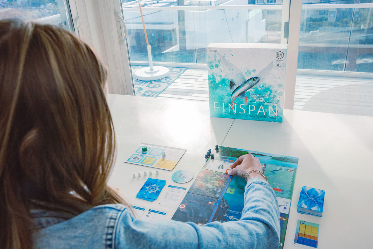 Finspan detailed game components including fish tokens and habitat cards