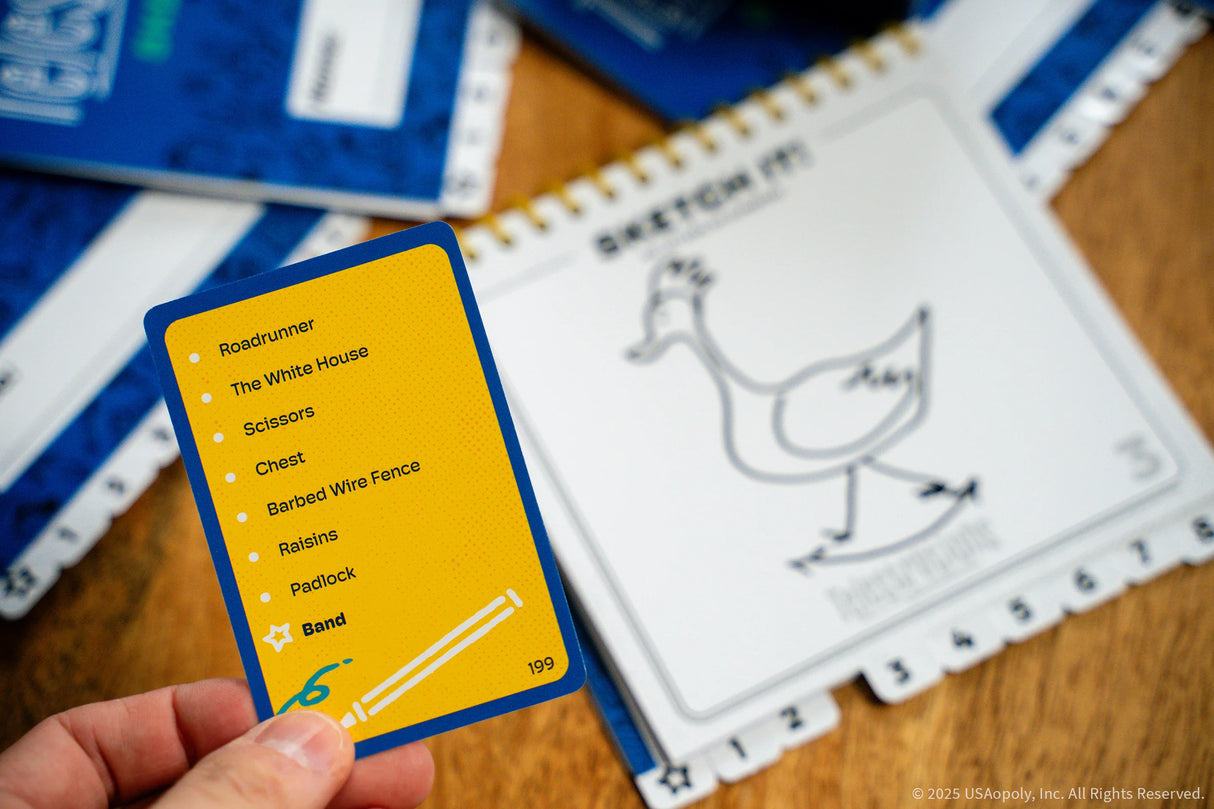 Telestrations 8 player party pack (2nd Edition) board game party atmosphere with players enjoying