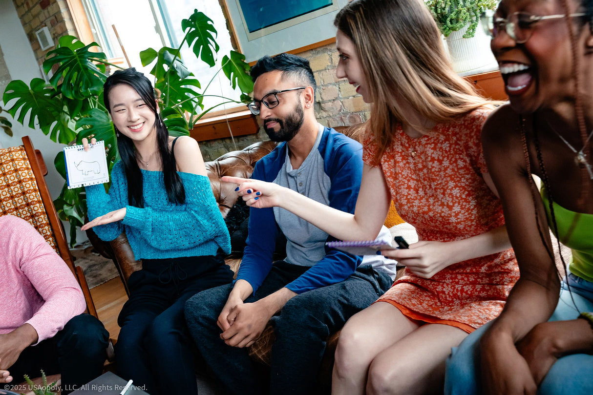 Telestrations 8 player party pack (2nd Edition) board game social gameplay moment with laughter