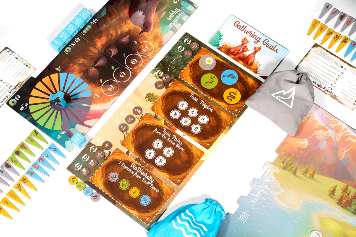 Nestlings game setup with nest building components