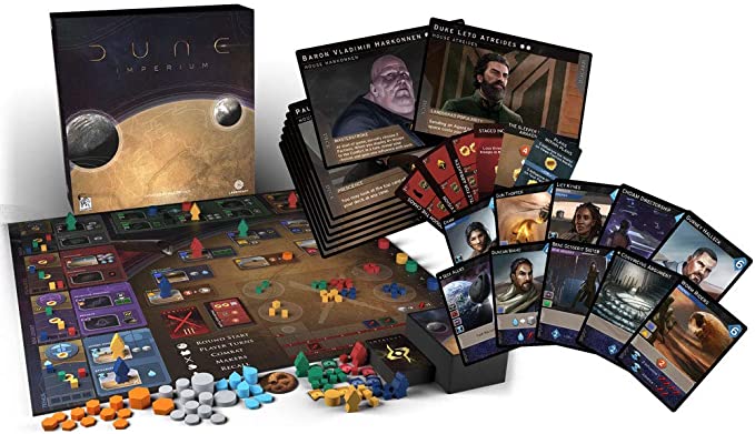Dune Imperium game components including deck-building and worker placement mechanics on Arrakis