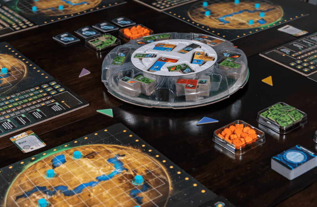 Planet Unknown game components and planet boards