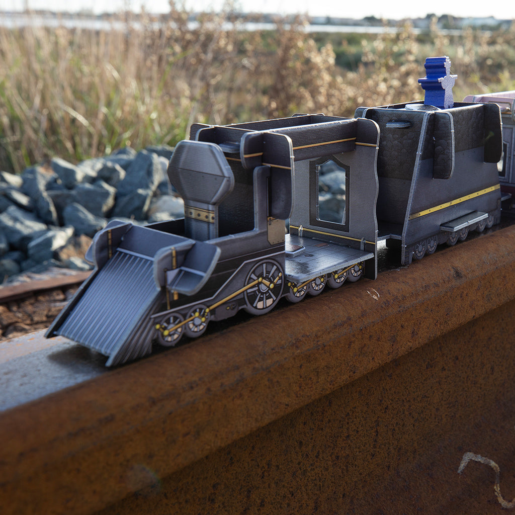 Colt Express: Couriers & Armored Train board game expansion box showing Wild West train robbery theme