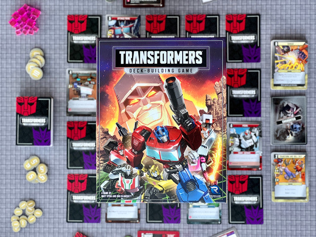 Transformers DBG board game box and components displayed