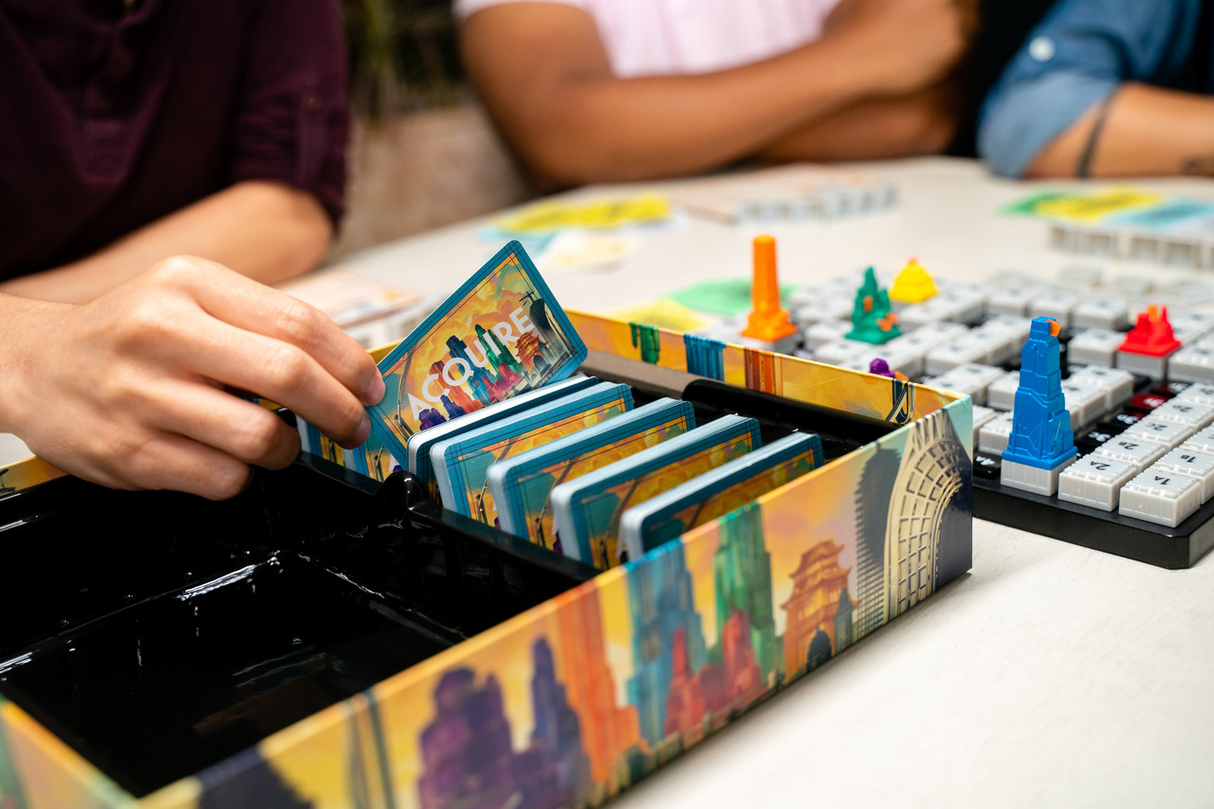 Acquire business strategy game components