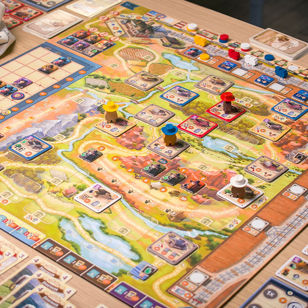 Great Western Trail gameplay setup with building tiles