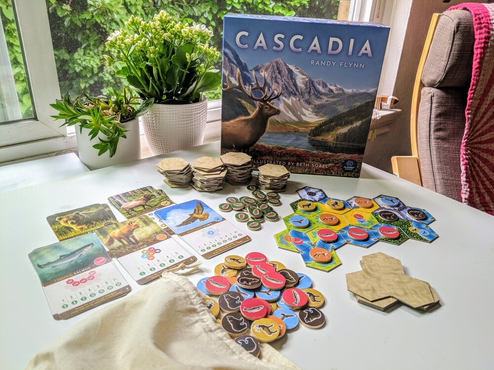 Cascadia board game box showing Pacific Northwest wildlife and habitat theme