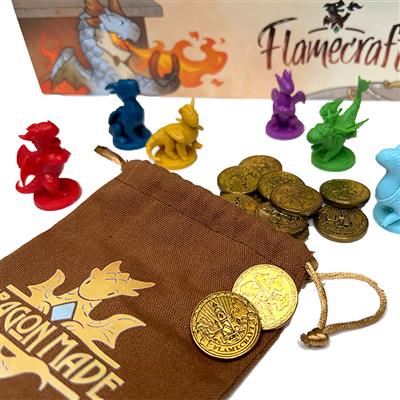 Flamecraft board game gameplay setup with dragon tokens