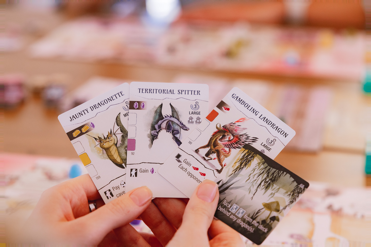 Wyrmspan dragon cards and cave boards