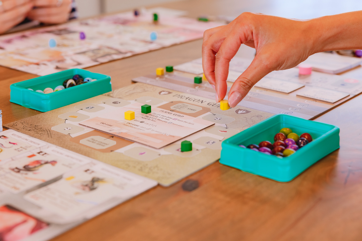 Wyrmspan gameplay setup with player boards