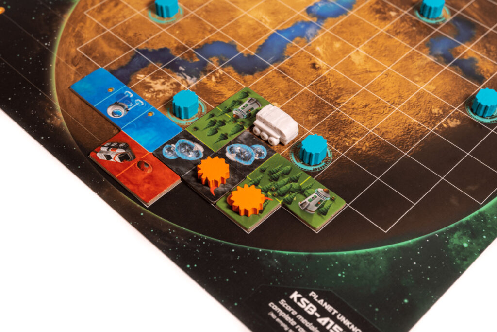 Planet Unknown detailed game pieces and rovers