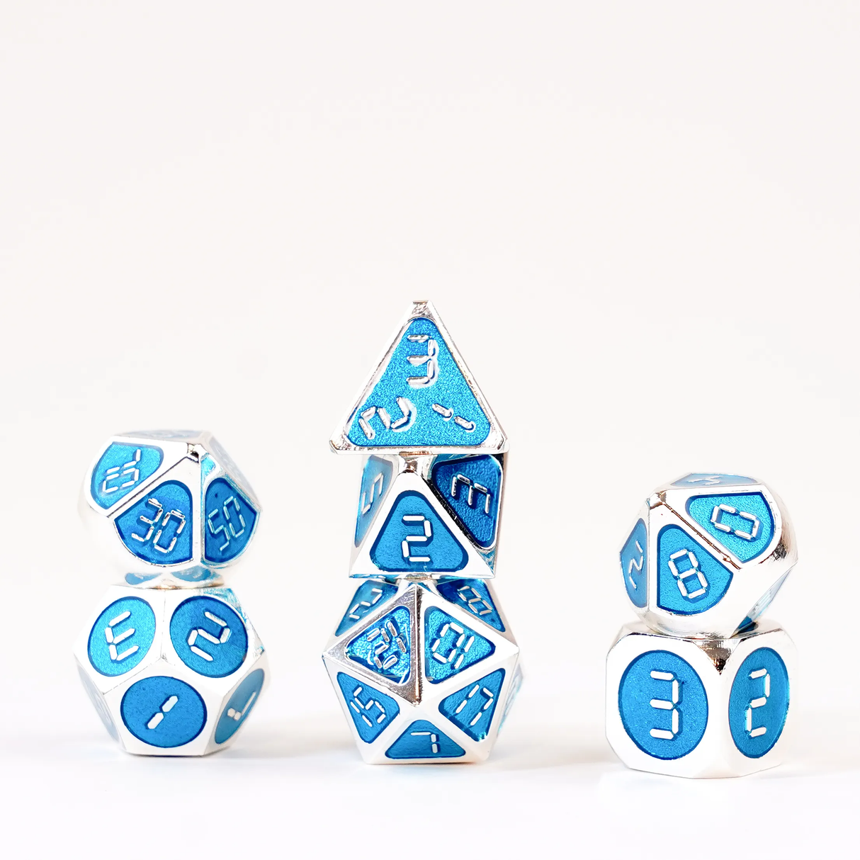 16mm Metal Polyhedral Dice: Silver with teal enamel close-up detail