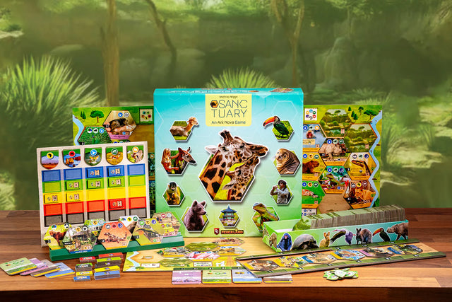 Educational game set with animal-themed cards and board on a wooden table.