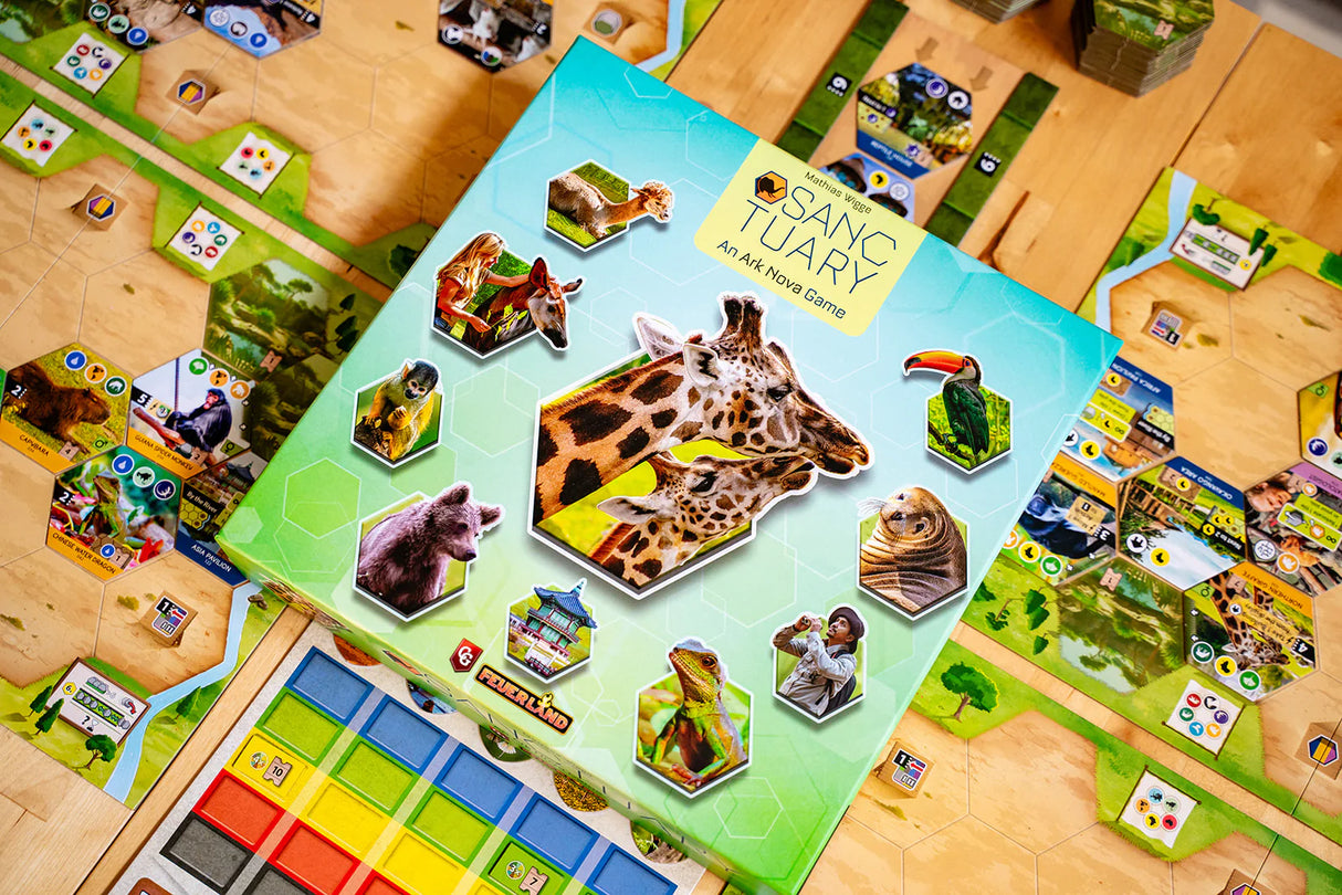 Board game with animal-themed cards on a wooden table